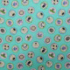 Tissu coton imprimé Animalia Bleu turquoise